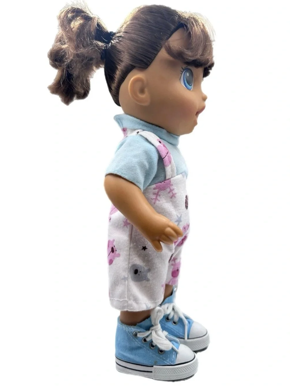 Dress-Up Baby Doll with Pink Floral Skirt and Blue Accessories